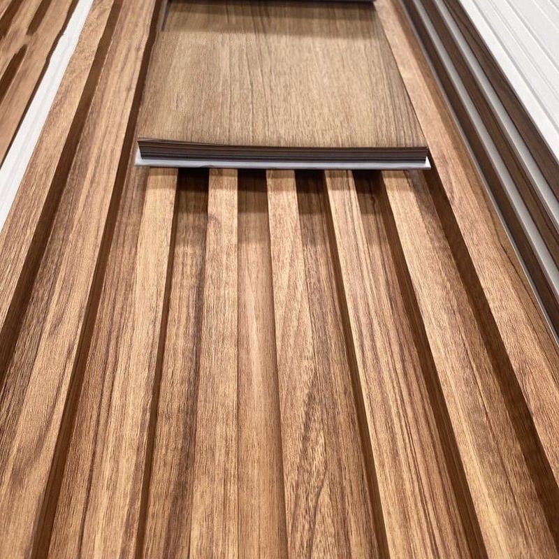 Εργοστάσιο εσωτερικής διακόσμησης PVC επικάλυψη επικάλυψη τοίχου WPC εσωτερικό πλεόνασμα τοίχου